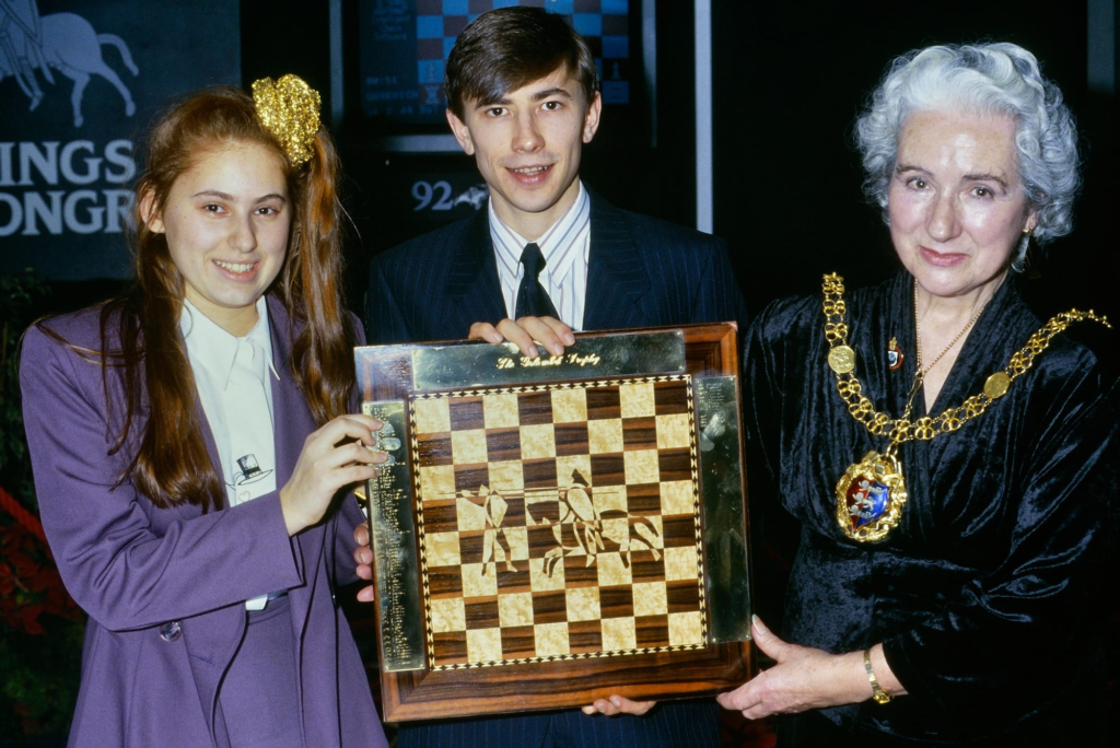Presentation of the Golombek Trophy to Judit Polgar (L) and Evgeny Bareev (R). Foreign & Colonial Hastings Premier Chess tournament 1992/93. Alamy
