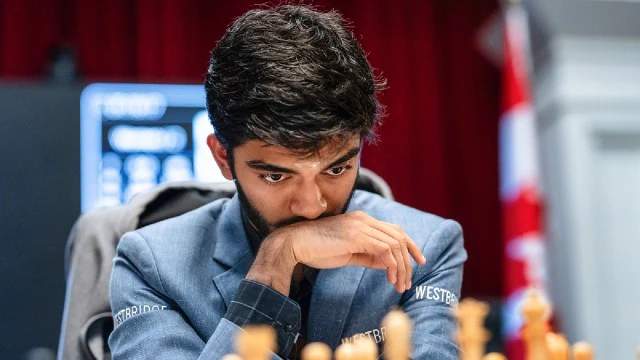 Grandmaster D. Gukesh of India during his Round 14 match against Grandmaster Hikaru Nakamura of USA at the FIDE Candidates 2024 chess tournament, in Toronto, Canada, Sunday, April 21, 2024. (PTI Photo via FIDE/Michal Walusza)