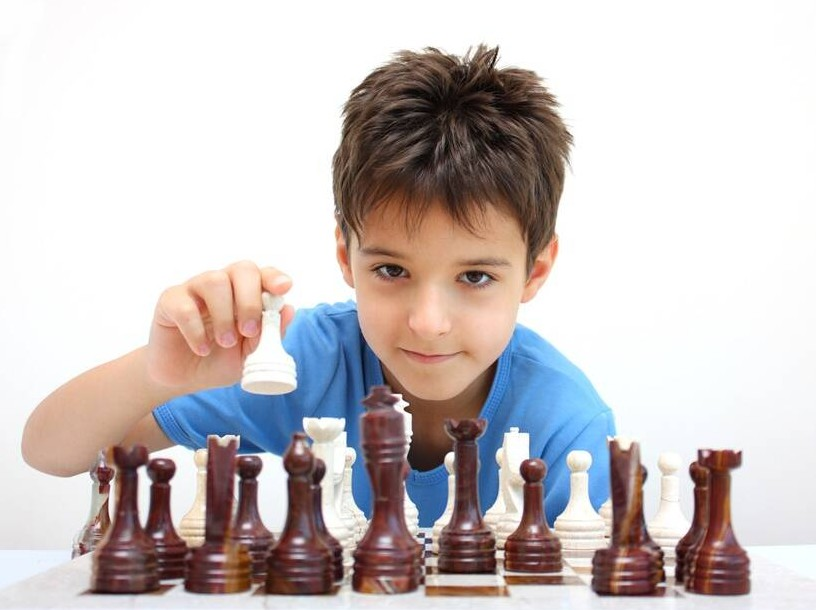 A Colorado student prepares to play a game of chesss