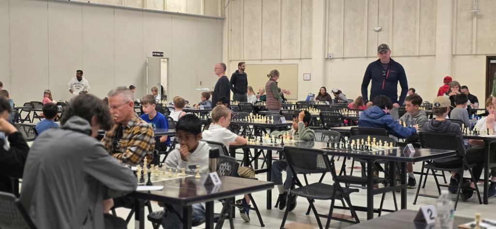 Students having a blast playing in Summit School of Chess Tournament Series in Denver/Golden Colorado