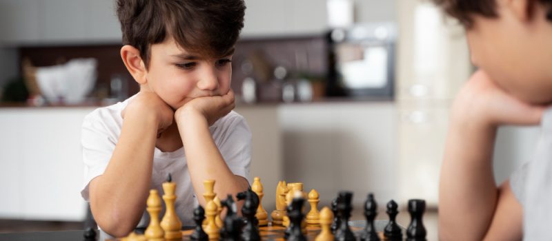 young-kids-playing-chess-together